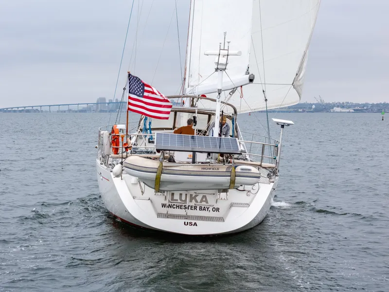 Slide: The Image of Sailing yacht "Luka" on water, Farr 60 Pilot House, 1997, with American flag. - 5
