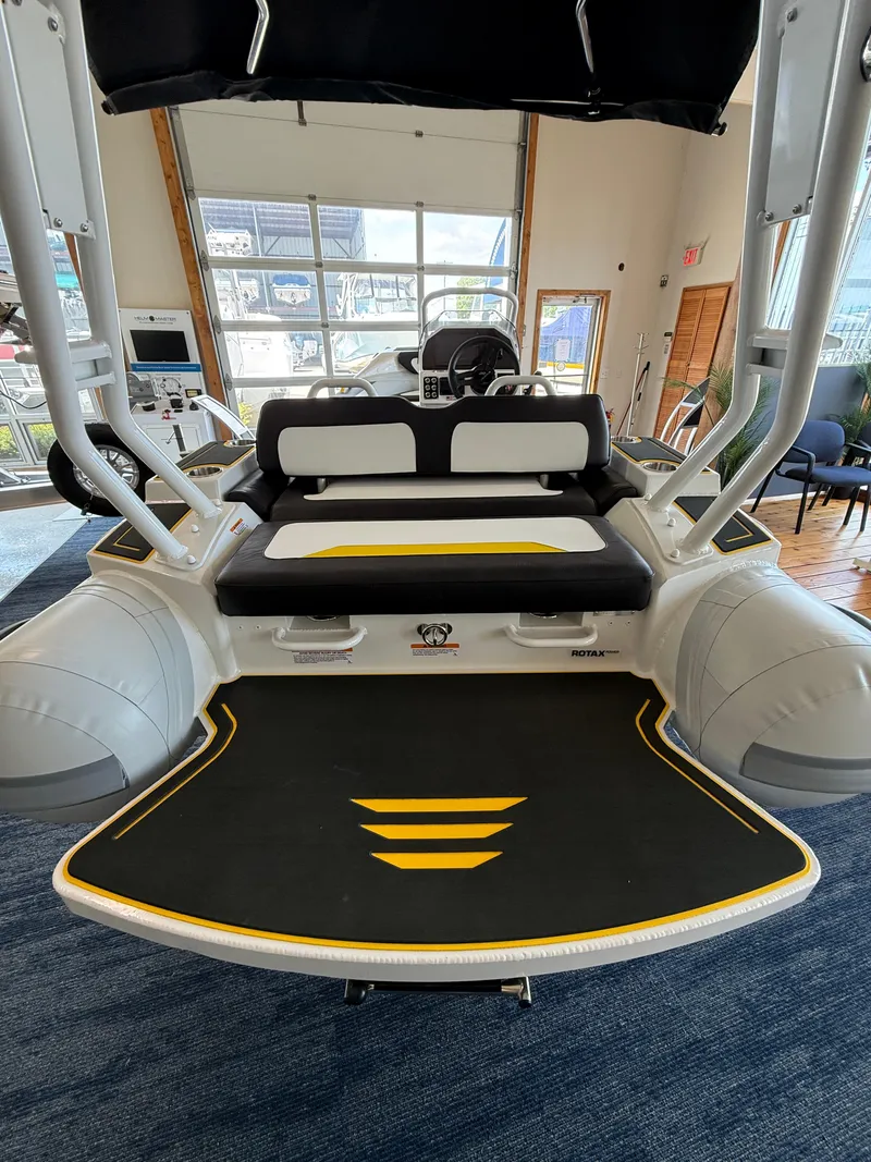 Slide: The Image of 2025 Highfield Velox 420 boat interior with modern seating and sleek design. - 7