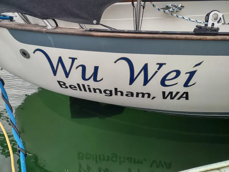 Slide: The Image of Pacific Seacraft 37 sailboat named "Wu Wei" docked in Bellingham, WA, 1997 model. - 49