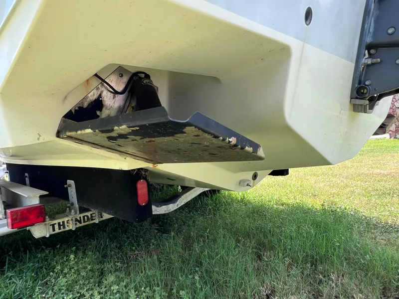 Slide: The Image of 2005 Hydra-Sports Vector 2400 CC boat on trailer, showing hull and trim tab. - 10