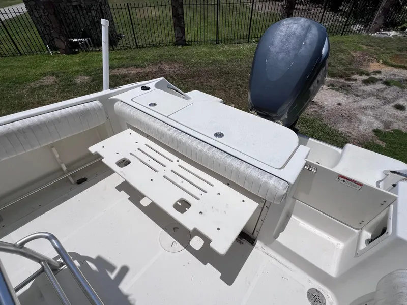 Slide: The Image of 2005 Hydra-Sports Vector 2400 CC boat interior with seating and motor, viewed from above. - 14