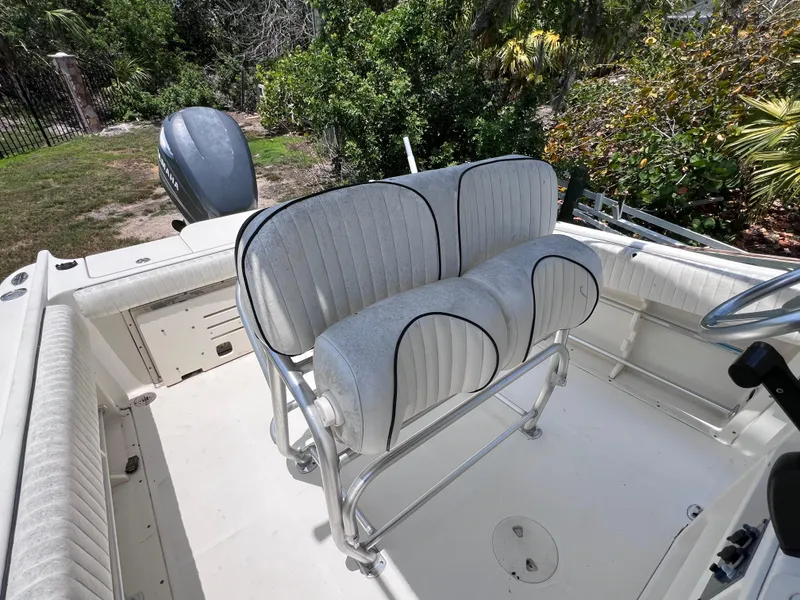 Slide: The Image of 2005 Hydra-Sports Vector 2400 CC boat interior with dual seating and outboard motor. - 16