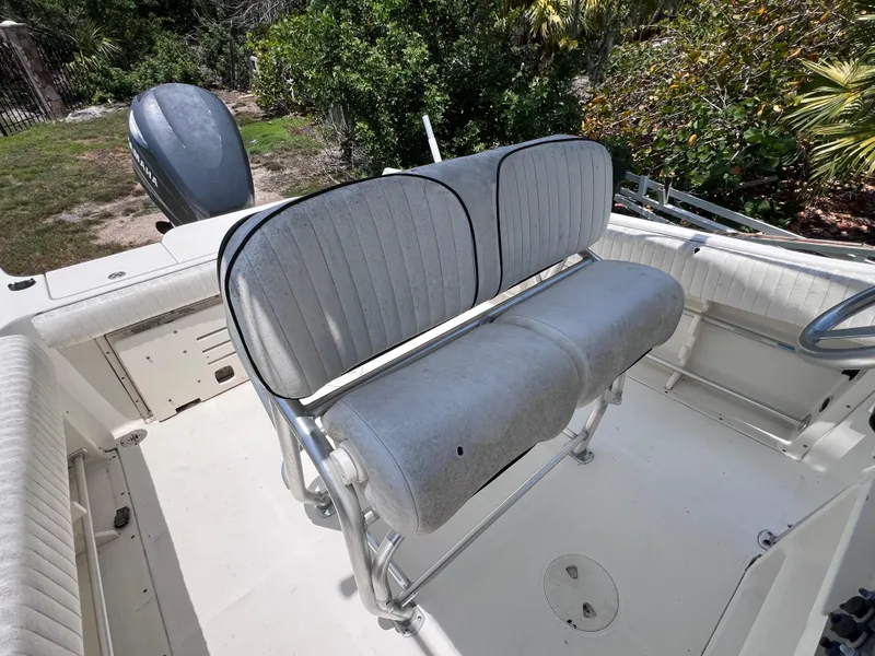 Slide: The Image of 2005 Hydra-Sports Vector 2400 CC boat interior with dual seating and outboard motor. - 18