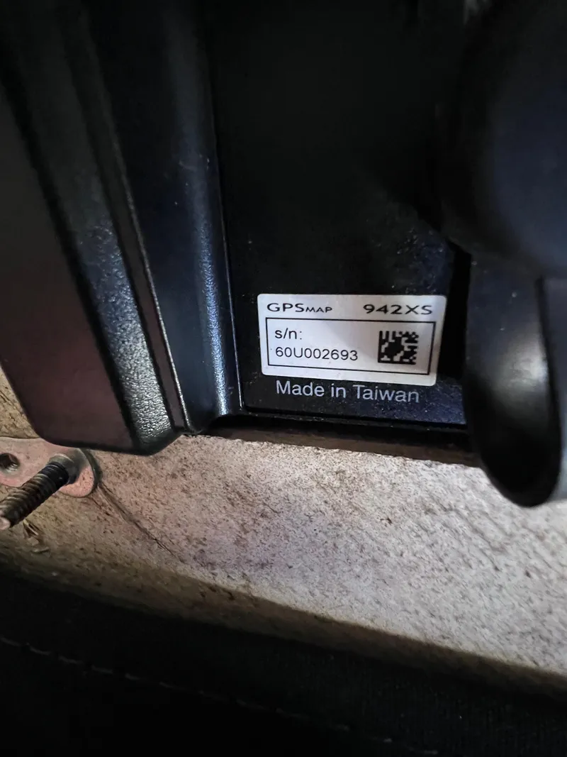 Slide: The Image of Close-up of a GPSmap 942XS device, serial number 60U002693, made in Taiwan. - 26