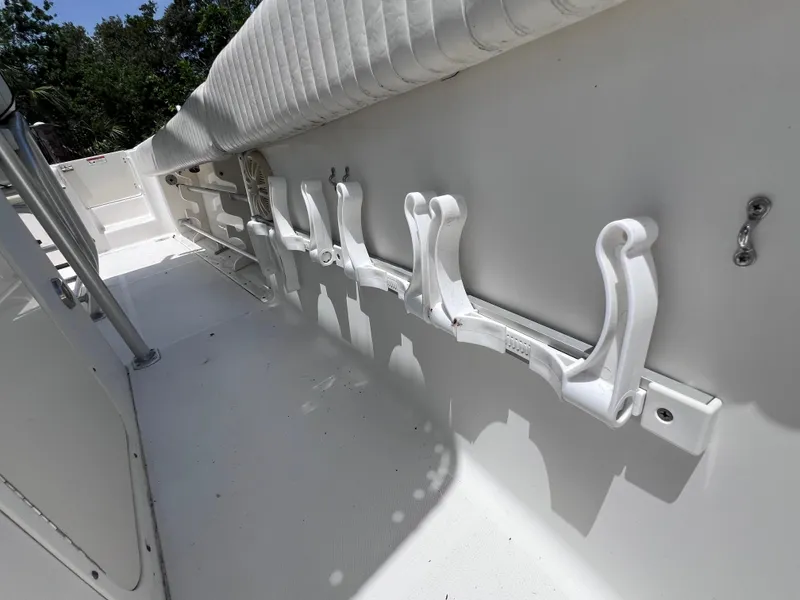 Slide: The Image of 2005 Hydra-Sports Vector 2400 CC boat with rod holders and cushioned seating. - 32