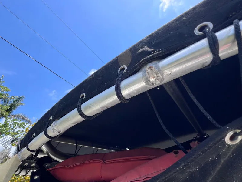 Slide: The Image of 2005 Hydra-Sports Vector 2400 CC boat canopy detail under clear blue sky. - 36