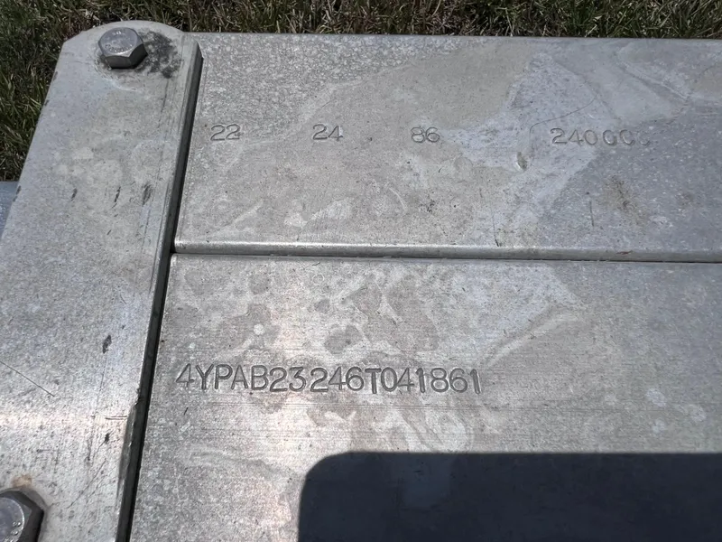 Slide: The Image of 2005 Hydra-Sports Vector 2400 CC metal surface with engraved serial number. - 9