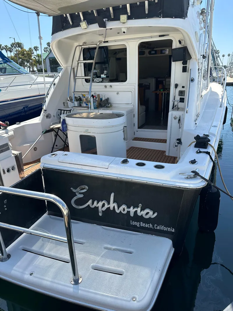 Slide: The Image of Riviera 37 Flybridge yacht, 2003 model, docked in Long Beach, California. - 33