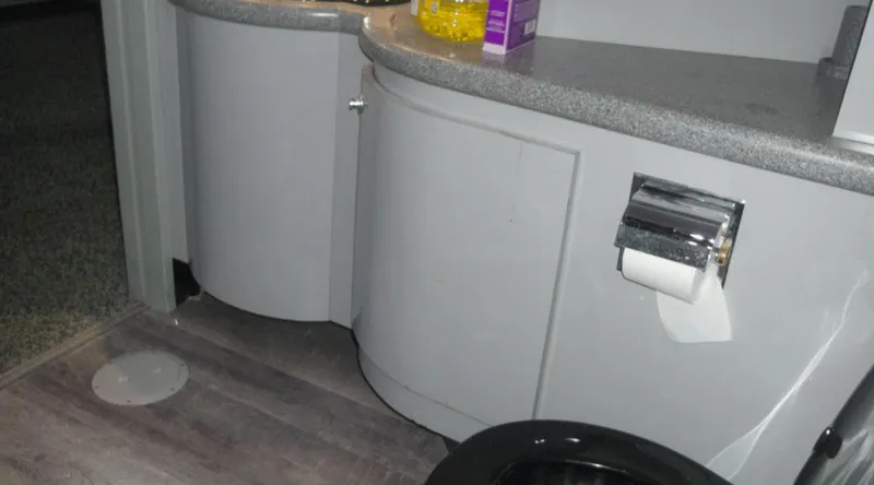 Slide: The Image of Bathroom interior of 1991 New York Yachts 88, featuring modern fixtures and storage. - 10