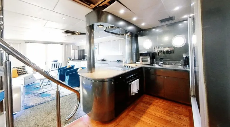 Slide: The Image of Luxurious yacht interior with modern kitchen and seating, New York Yachts 88, 1991 model. - 21