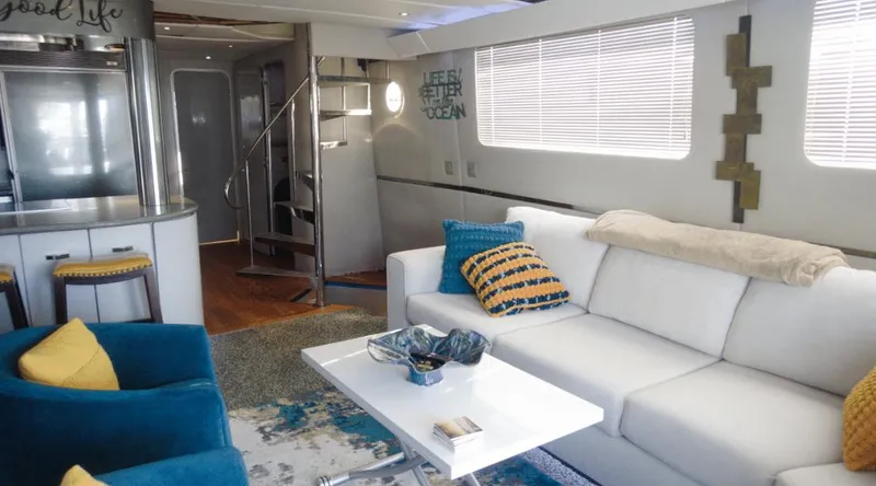 Slide: The Image of Luxurious interior of 1991 Custom New York Yachts 88 with modern decor and comfortable seating. - 24