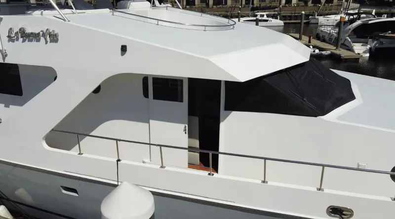 Slide: The Image of Custom New York Yachts 88, 1991 model, docked at marina, side view. - 37