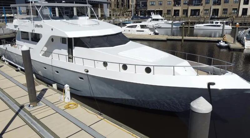 Slide: The Image of Luxury yacht docked at marina, Custom New York Yachts 88, 1991 model. - 43