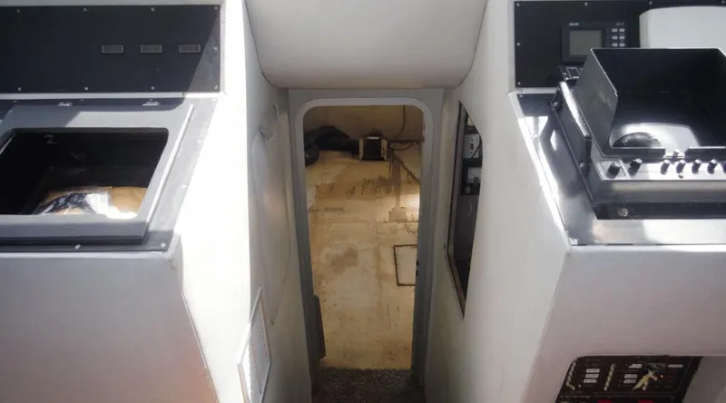 Slide: The Image of Interior view of a 1991 Custom New York Yachts 88, featuring control panels and equipment. - 7