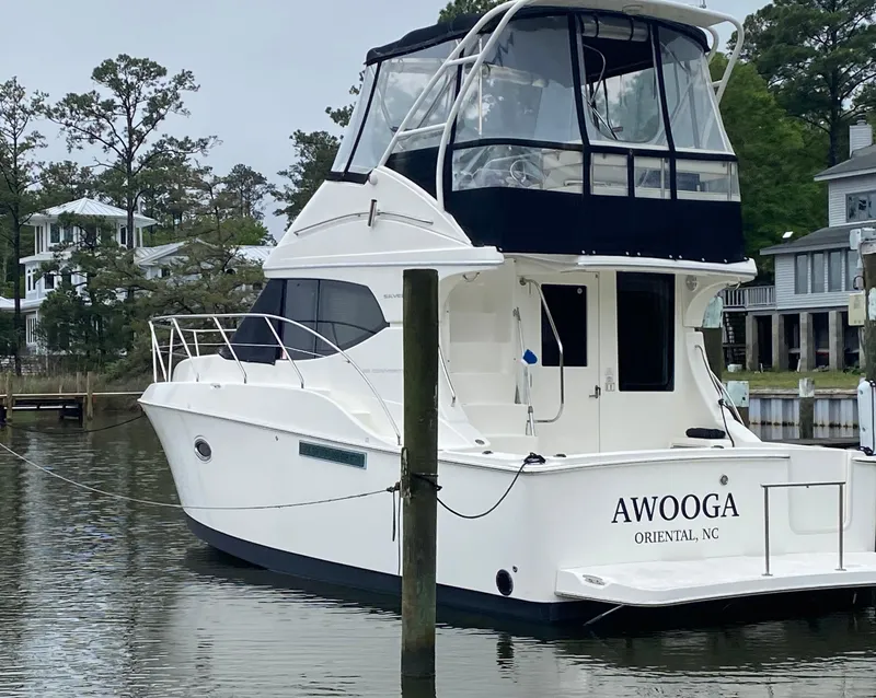 Slide: The Image of 2008 Silverton 33 Convertible boat docked in Oriental, NC marina. - 3