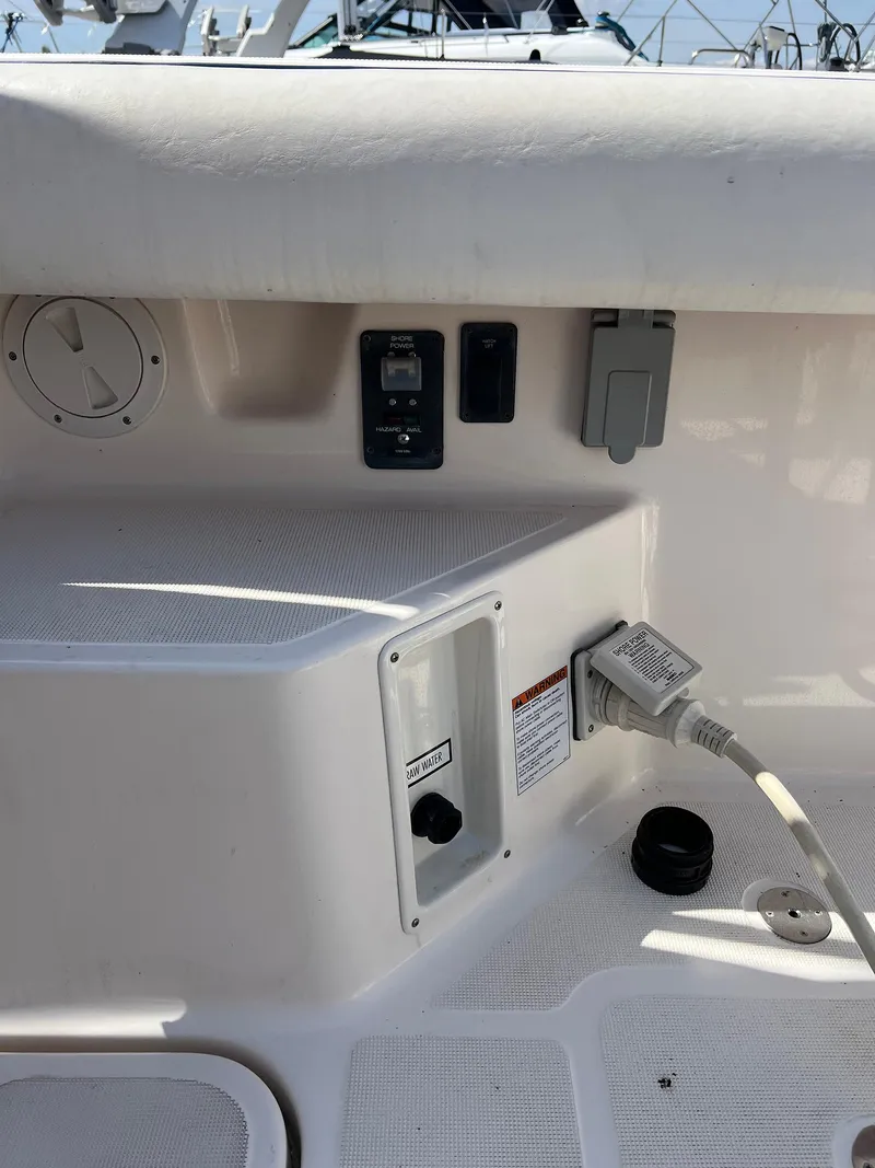 Slide: The Image of 2006 Tiara Yachts 2900 Coronet electrical panel and connections on deck. - 12