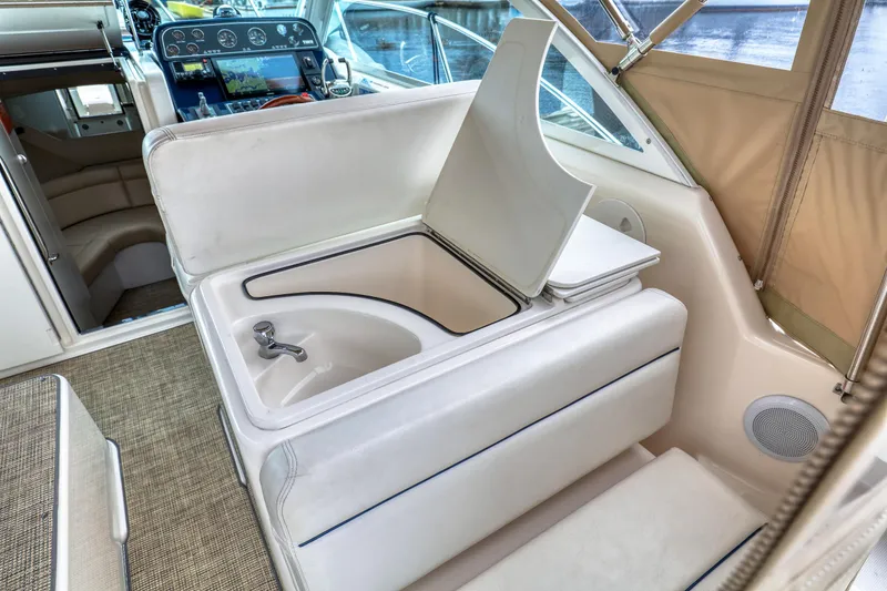 Slide: The Image of 2006 Tiara Yachts 2900 Coronet interior with sink and seating area. - 17