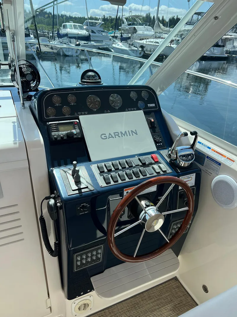 Slide: The Image of Helm of 2006 Tiara Yachts 2900 Coronet with Garmin navigation system, docked at marina. - 19