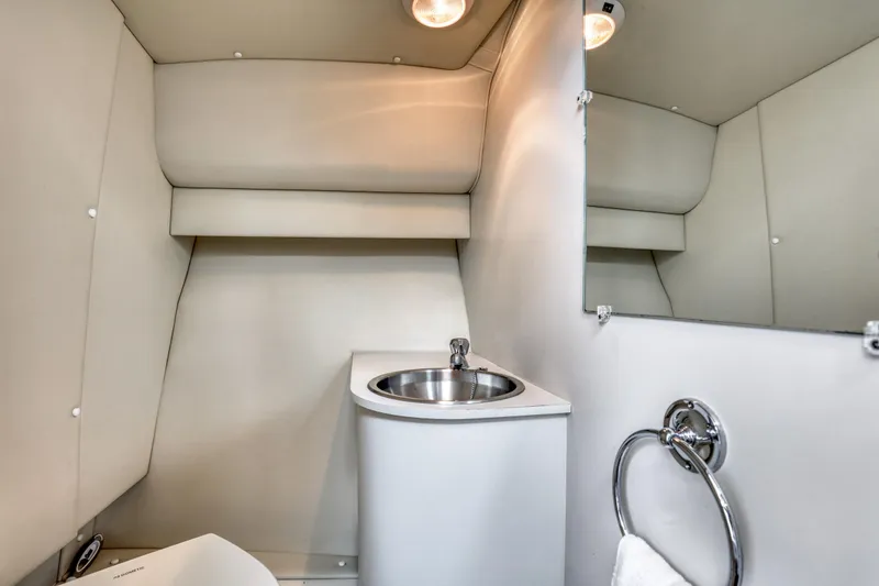 Slide: The Image of 2006 Tiara Yachts 2900 Coronet bathroom with sink and mirror. - 27