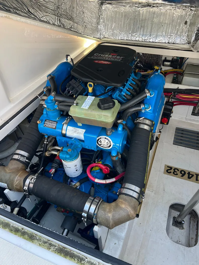 Slide: The Image of Engine compartment of a 2006 Tiara Yachts 2900 Coronet, featuring a Crusader engine. - 30