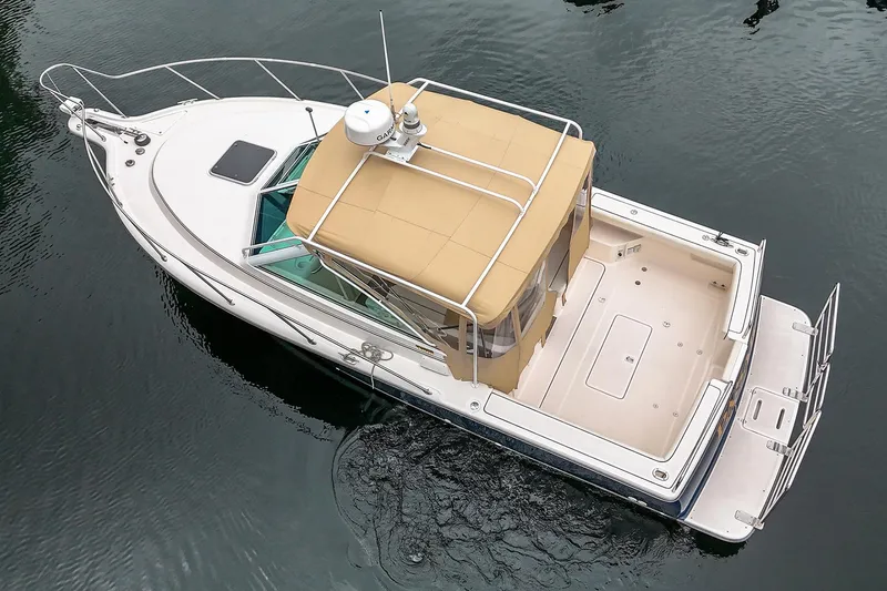 Slide: The Image of 2006 Tiara Yachts 2900 Coronet boat on calm water, aerial view. - 4