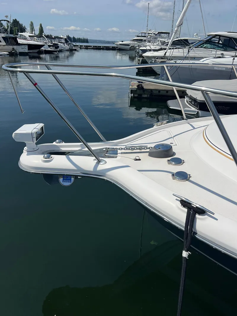 Slide: The Image of 2006 Tiara Yachts 2900 Coronet docked in a marina, calm water reflection. - 8