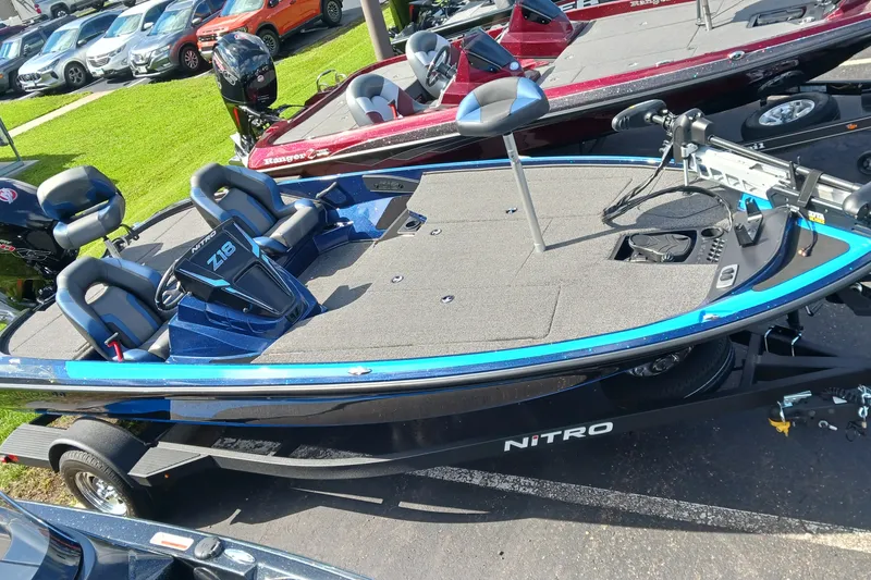 The Image of 2025 Nitro Z18 Pro fishing boat with dual seats and trolling motor on display. - 0