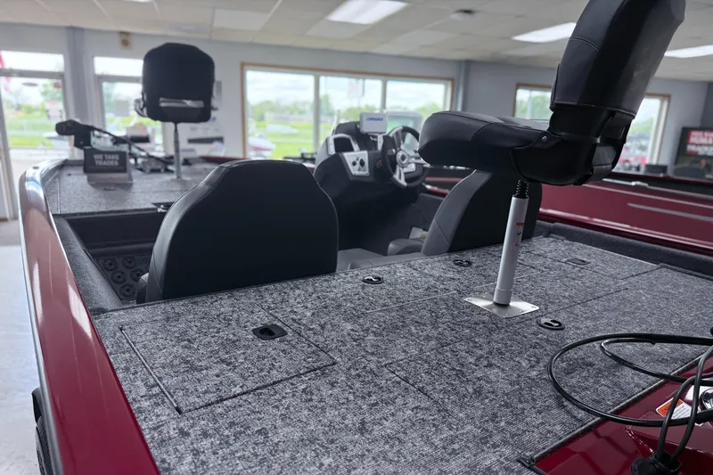 Slide: The Image of 2025 Tracker Pro Team 195 Tournament Edition boat interior with seating and control panel. - 10