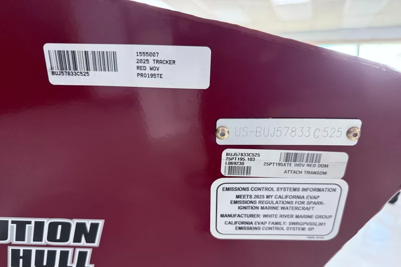 Slide: The Image of 2025 Tracker Pro Team 195 Tournament Edition hull identification and emissions labels. - 12