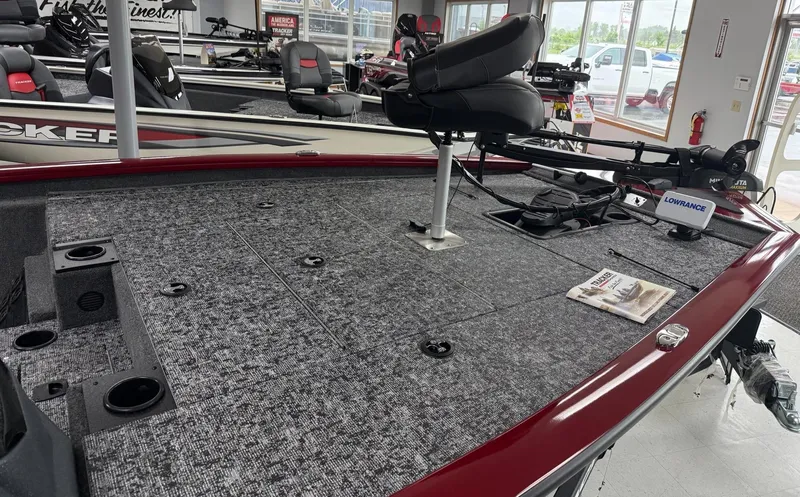Slide: The Image of 2025 Tracker Pro Team 195 Tournament Edition boat interior with fishing seat and equipment. - 6