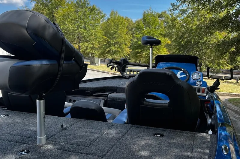 Slide: The Image of Interior of a 2025 Nitro Z18 boat with seating and control panel. - 5