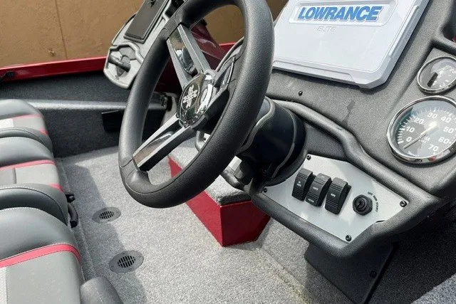 Slide: The Image of 2025 Ranger RT188P boat interior with steering wheel, Lowrance Elite display, and control switches. - 6