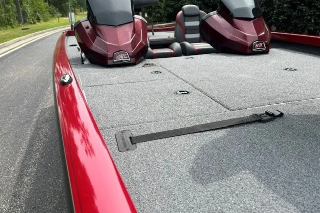 Slide: The Image of 2025 Ranger RT188P boat with red exterior and spacious gray deck. - 5