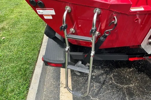 Slide: The Image of Rear view of a 2025 Ranger RT188P boat with a foldable ladder. - 9