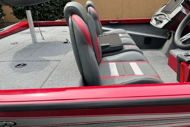 Slide: The Image of 2025 Ranger RT188P boat interior with gray and red seating, showcasing modern design. - 8
