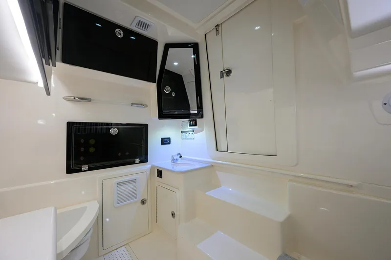 Slide: The Image of 2022 Cobia 350 Center Console interior with modern amenities and sleek design. - 26