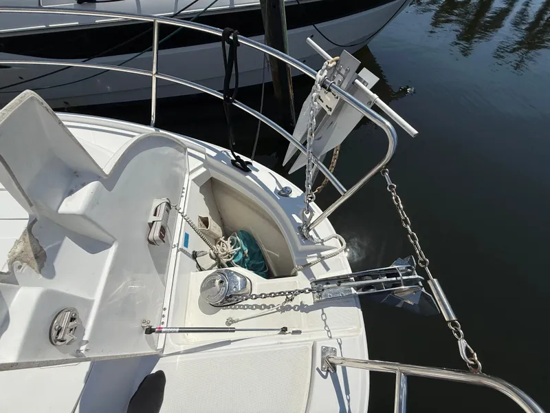 Slide: The Image of 2018 Jeanneau NC 895 boat deck with anchor and railing details. - 8
