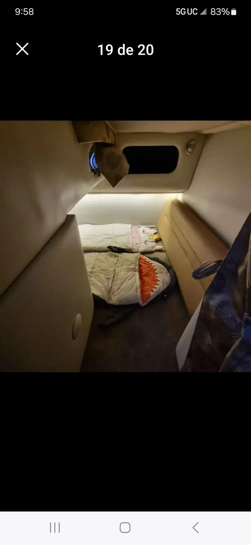 Slide: The Image of Interior cabin of 2017 Crownline 294 CR boat with cozy sleeping area. - 37