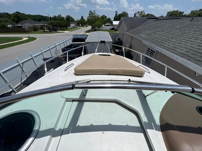 Slide: The Image of 2017 Crownline 294 CR boat docked in residential area, view from bow. - 71