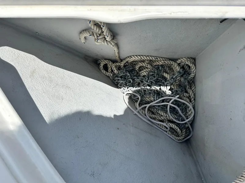 Slide: The Image of Coiled rope in storage compartment of 2005 Beneteau Swift Trawler 42. - 14