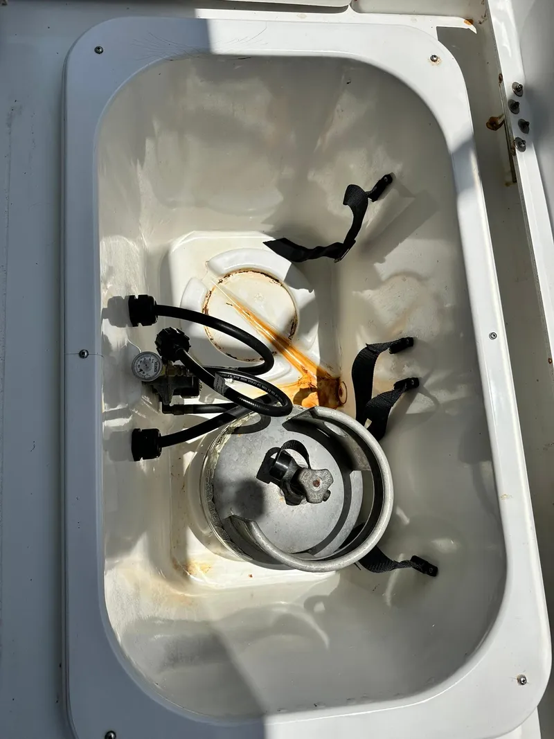 Slide: The Image of Storage compartment on a 2005 Beneteau Swift Trawler 42 with equipment and cables. - 34
