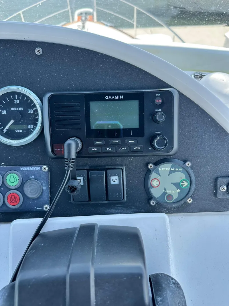 Slide: The Image of Control panel of a 2005 Beneteau Swift Trawler 42 with Garmin navigation system. - 47