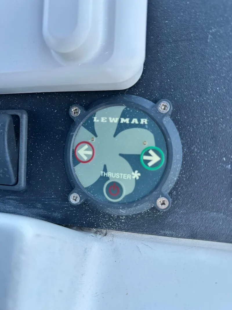 Slide: The Image of Lewmar thruster control on 2005 Beneteau Swift Trawler 42 boat dashboard. - 49
