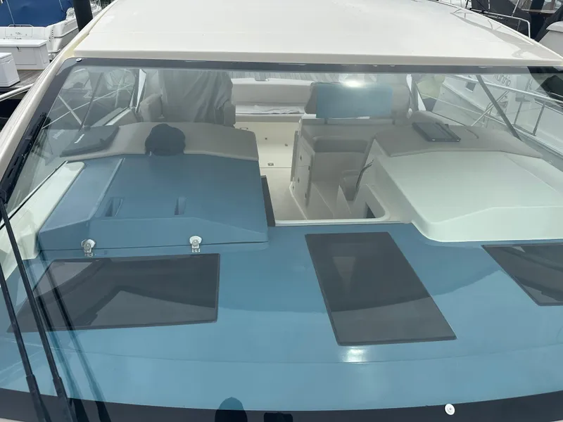 Slide: The Image of 2014 Pursuit SC 365i Sport Coupe boat interior view through windshield. - 27