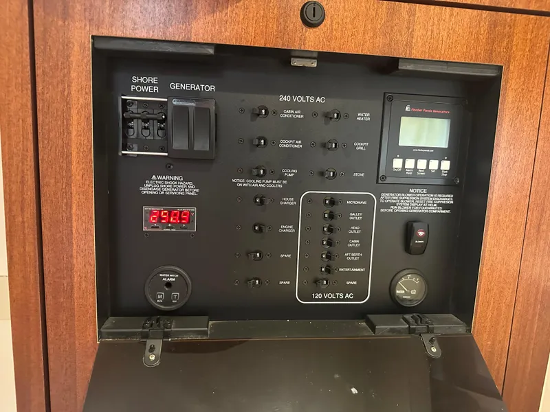 Slide: The Image of Electrical control panel of a 2014 Pursuit SC 365i Sport Coupe boat. - 43