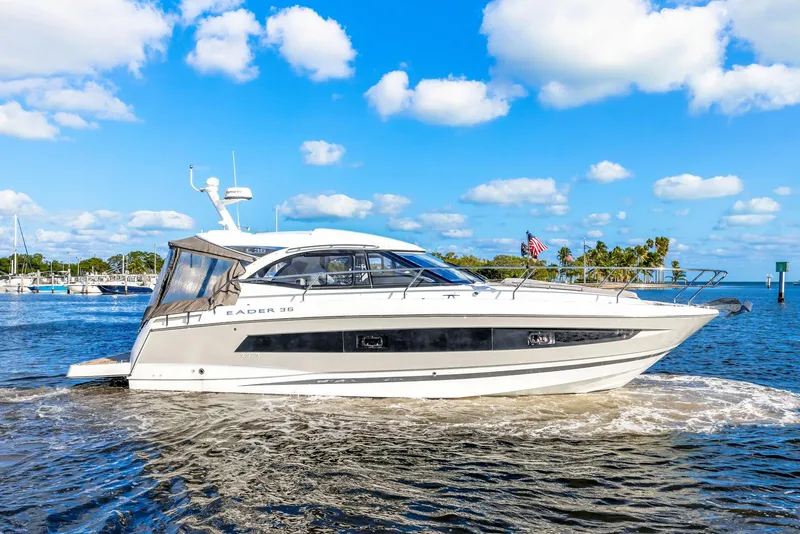 The Image of 2018 Jeanneau Leader 36 yacht cruising on a sunny day with blue skies. - 0