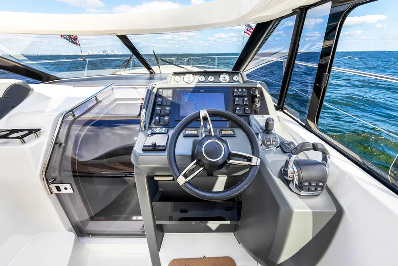 Slide: The Image of Helm of 2018 Jeanneau Leader 36 yacht with ocean view. - 8