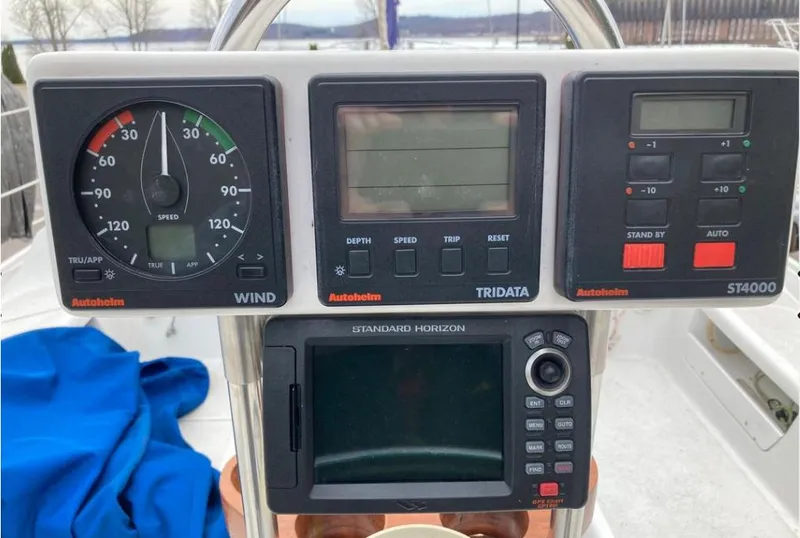 Slide: The Image of Control panel of a 1997 Catalina MkII sailboat with navigation instruments. - 4