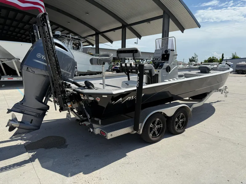 Slide: The Image of Avid FS23 Mag Platinum 2021 boat console with steering wheel and gauges. - 7