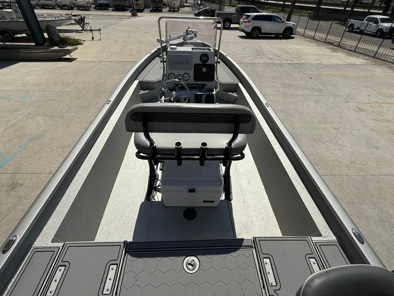 Slide: The Image of Avid FS23 Mag Platinum 2021 boat interior with steering console and seating. - 8